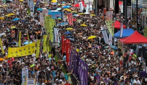 Thousands take to Hong Kong streets for pro-democracy rally