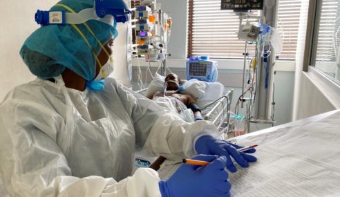 First known patient re-infected with South Africa coronavirus variant is in critical condition